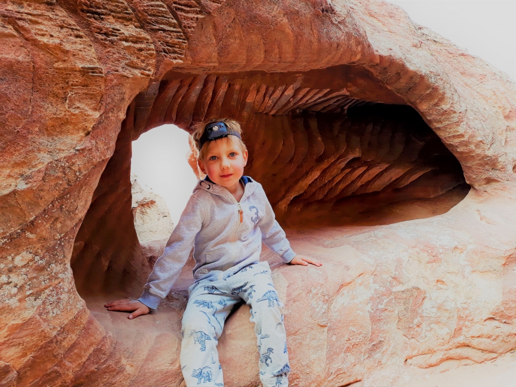 Ernie exploring the caves and crevices of Petra