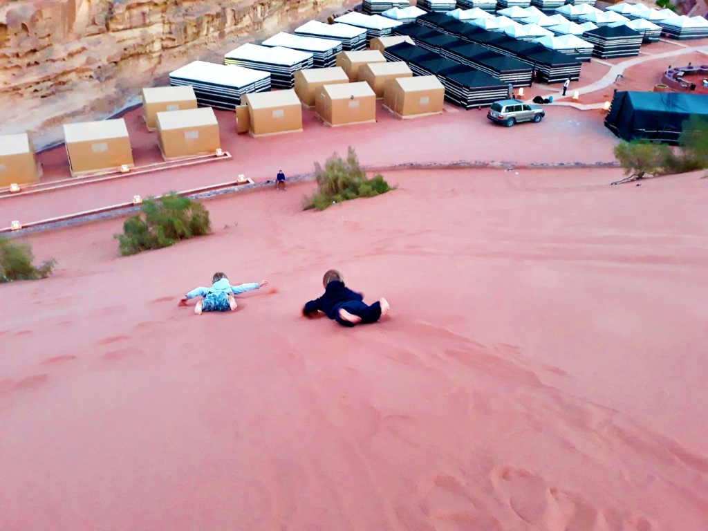 Sand dune surfing in Wadi Rum