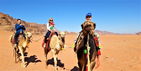 Visiting Jordan with kids: camel riding in Wadi Rum