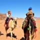 Visiting Jordan with kids: camel riding in Wadi Rum