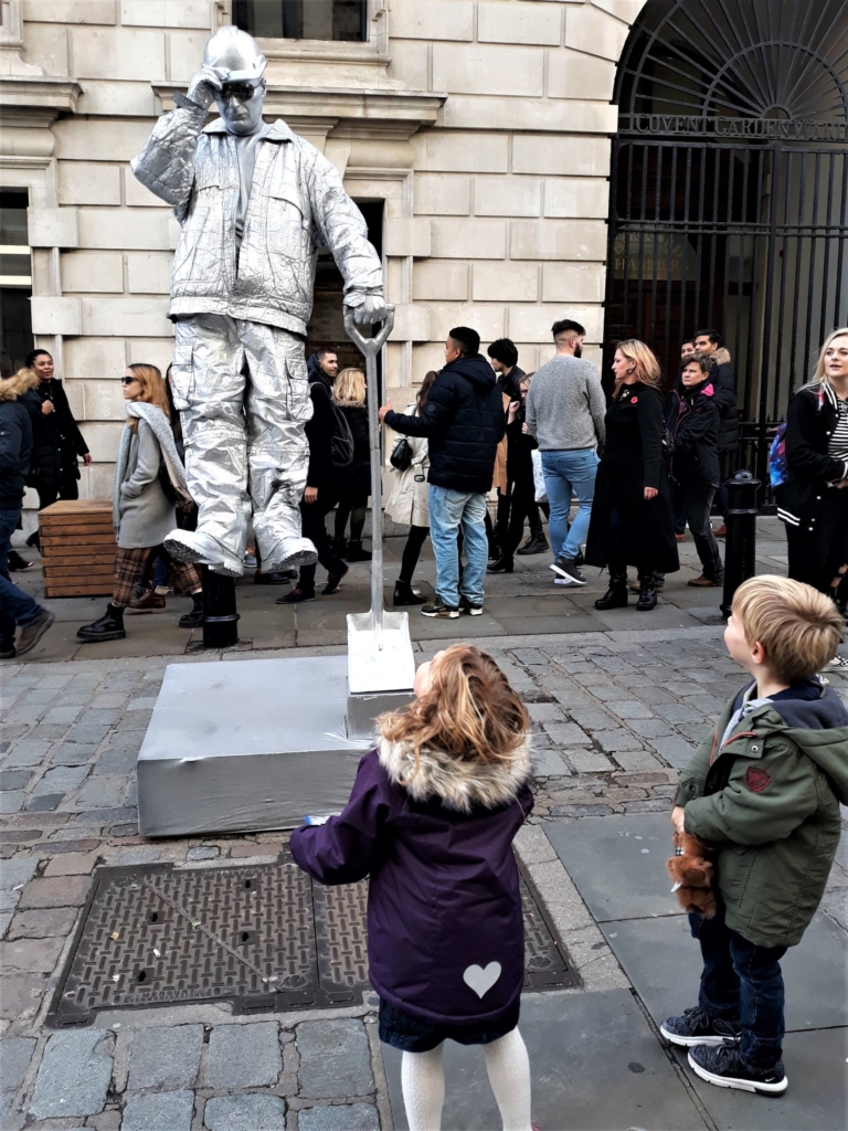 Best things to do in London with kids - watching street performers in covent Garden