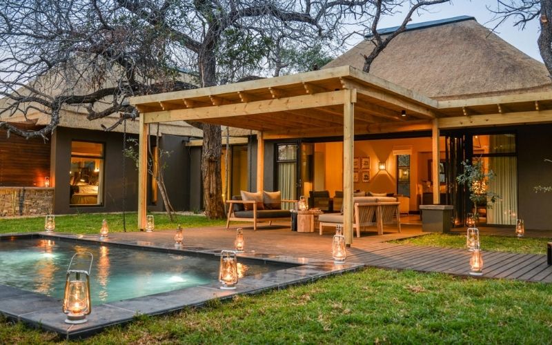 Pool and outdoor area of Hi'Nkweni Villa at Lions Sands Game Reserve.
