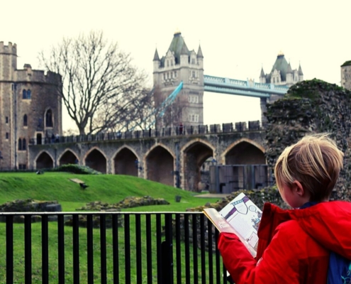 Studying the guidebook at the Tower of London