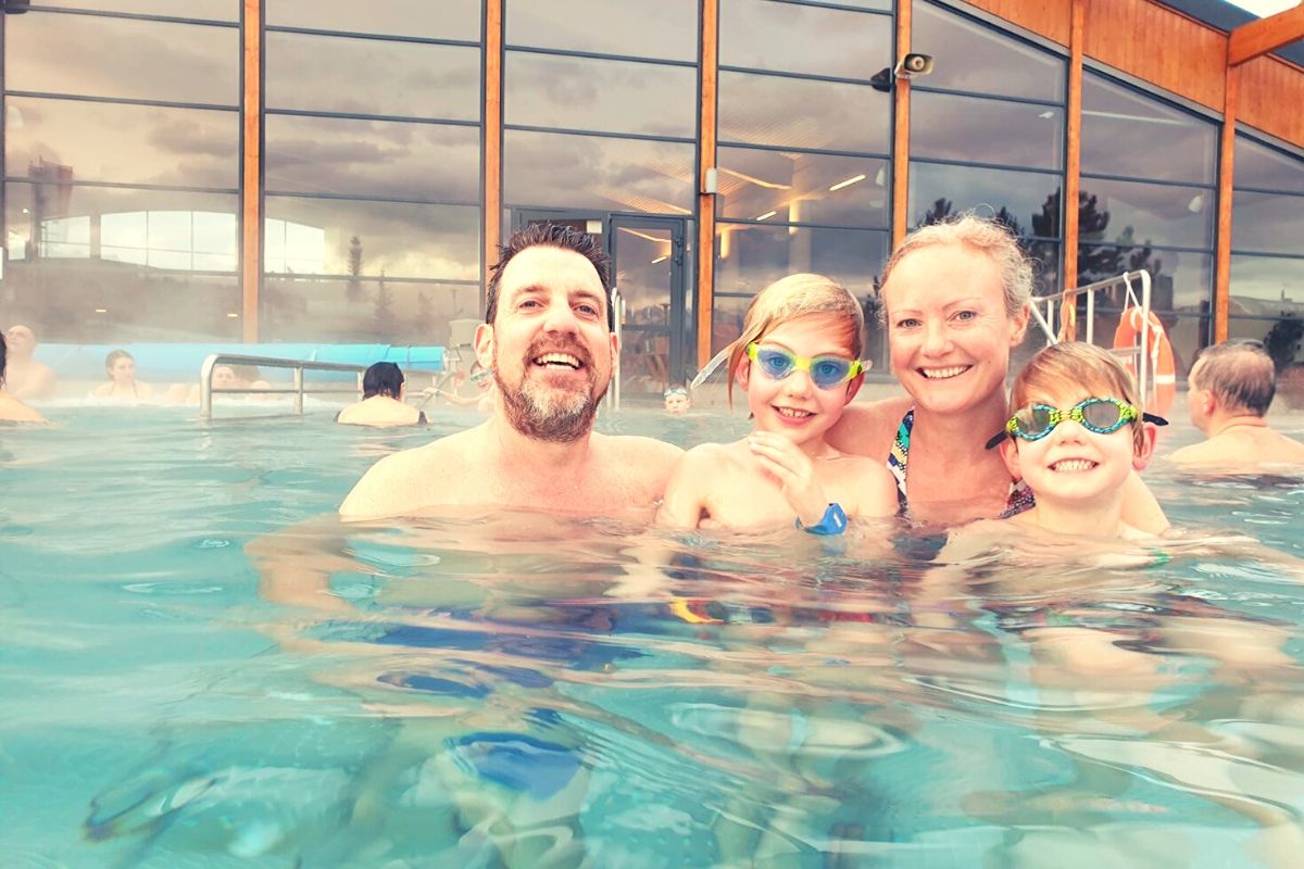 Family of four in the outdoor pool at Białka Tatrzańska Termy
