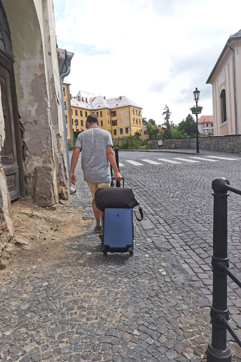 Level8 Cabin luggage being pulled along a cobbled street in Slovakia.
