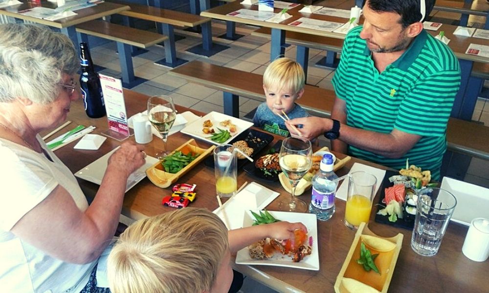 Kids eating Japanese food