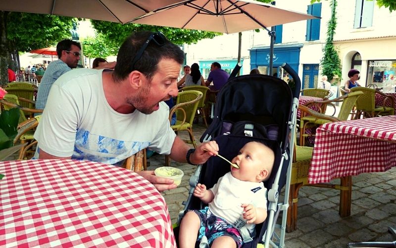 Feeding baby in a stroller