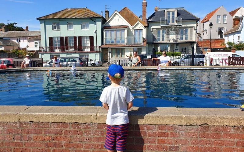 watching sailing boats at Aldeburgh boating pond.