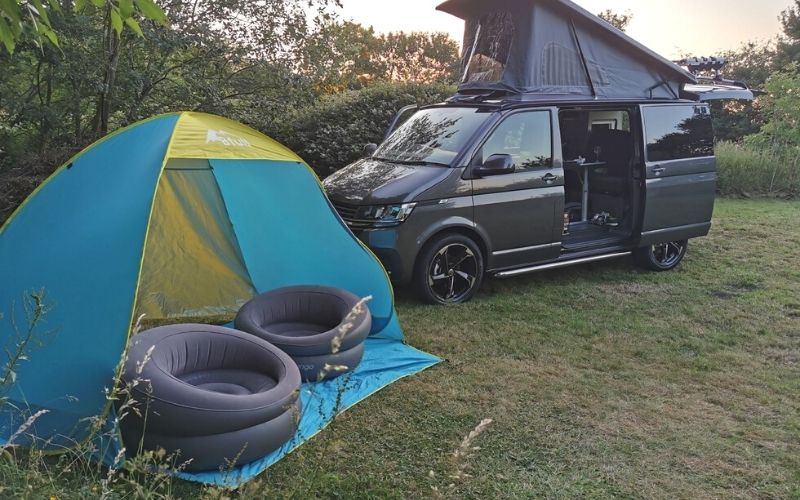 Campervanning with kids in the garden.