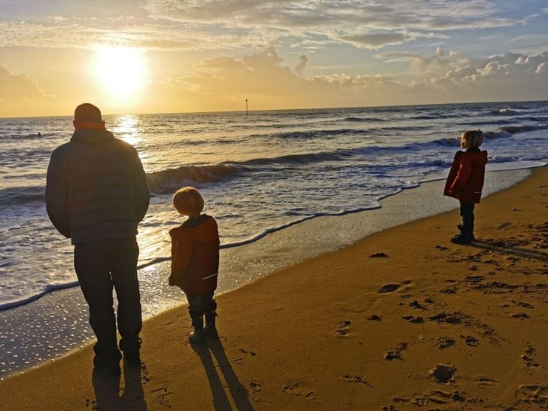 Catch a sunrise at the beach.