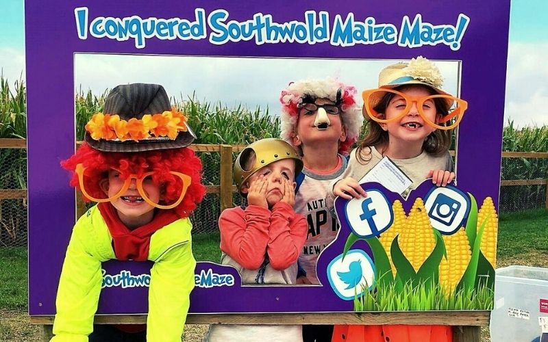 Kids in fancy dress at Southwold Maize Maze near Southwold in Suffolk