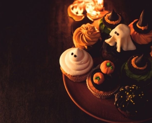 Halloween cupcakes on a plate.