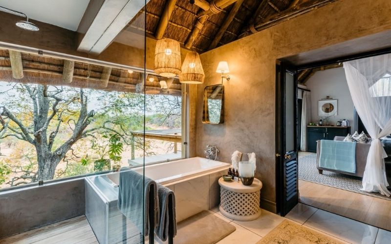 Bathroom with a view in a luxury suite at the Thornybush Game Lodge