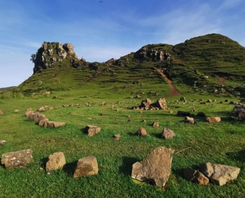 Ground level view of the stone circle and Castle Ewen at the Fairy Glen in Skye