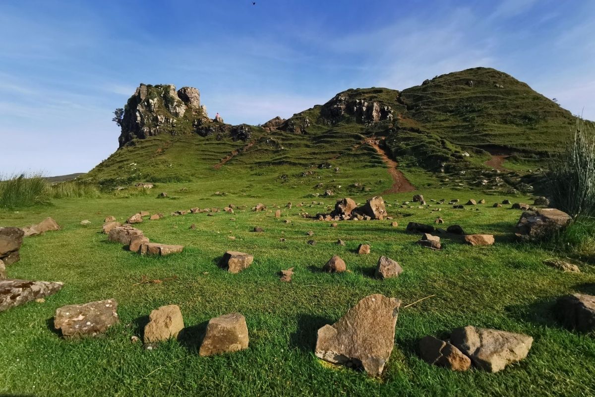 Ground level view of the stone circle and Castle Ewen at the Fairy Glen in Skye