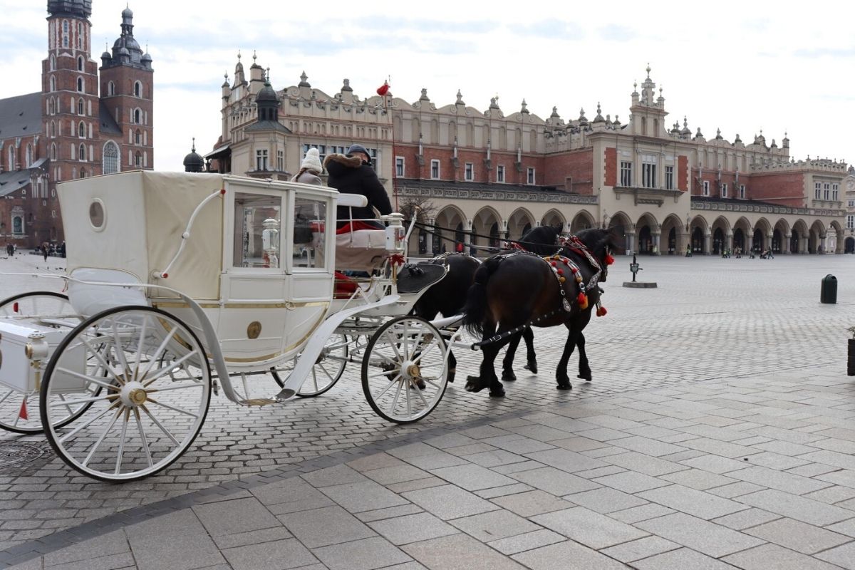 Horse drawn carriage in Krakow is one of the fun things to do in Krakow with kids.