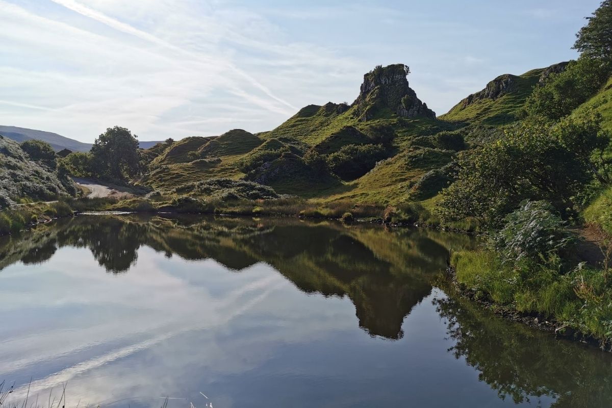 Reflection of Castle Ewen in the pond at the Fairy Glen on the Isle of Skye.