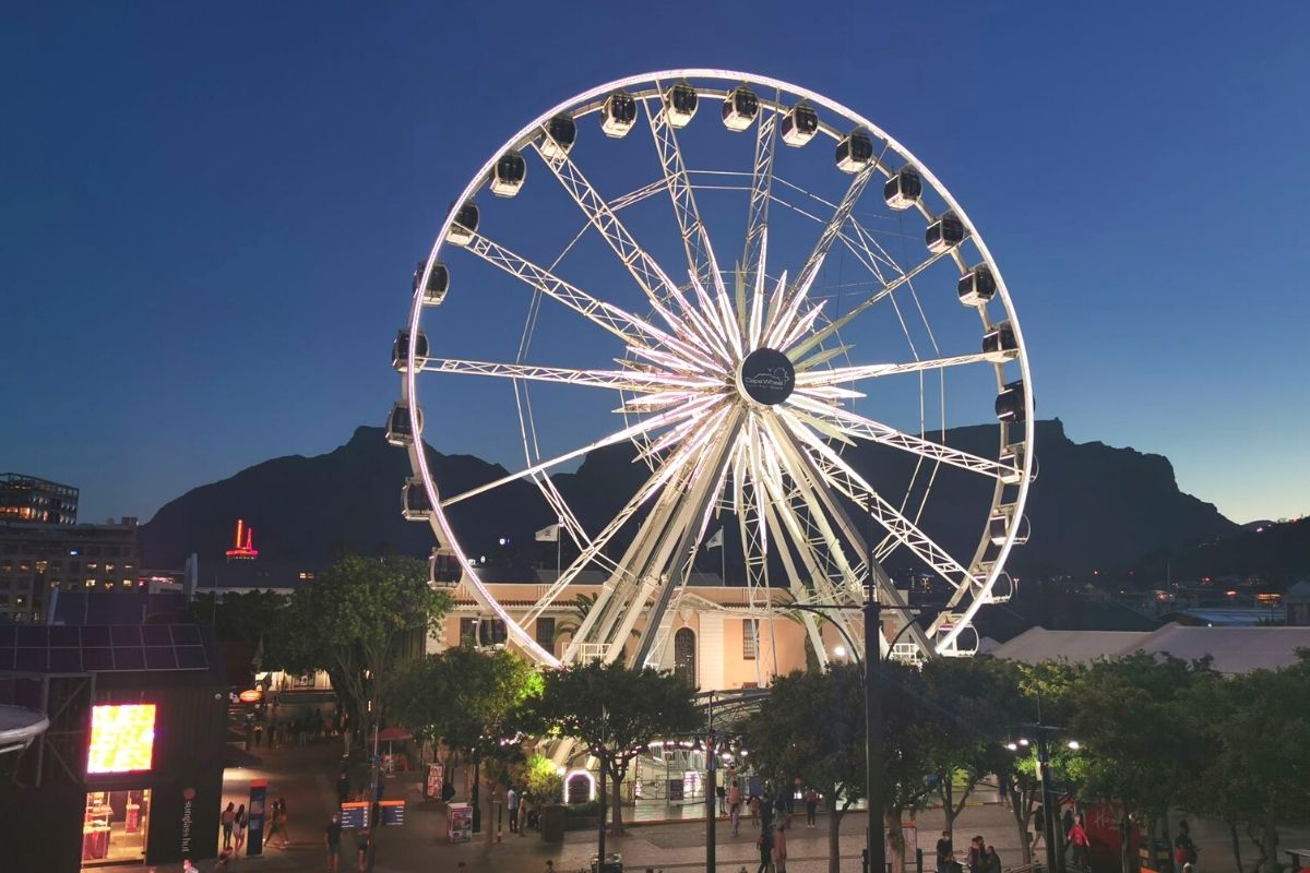 The Cape Wheel at the V&A Waterfront in Cape Town at dusk.