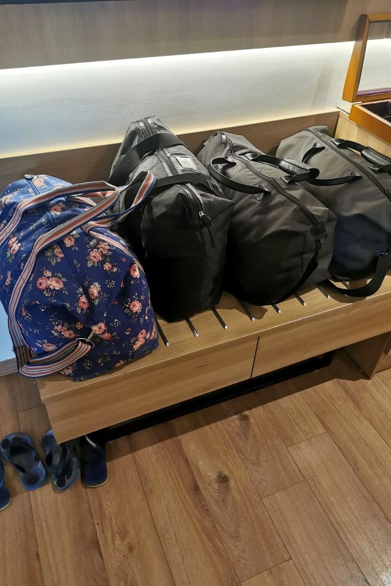 4 packed hand luggage bags.