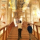 Two boys exiting the sarcophagus of Rameses V in the Valley of the Kings.