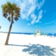 White sand, blue skies and palm trees at Clearwater Beach near Orlando in Florida.