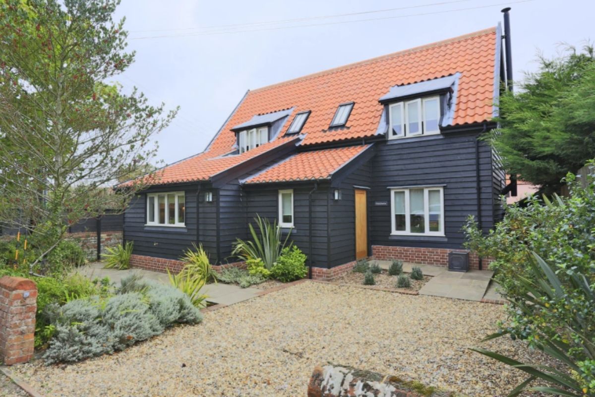 Exterior of Topsail holiday cottage in Thorpeness in Suffolk.