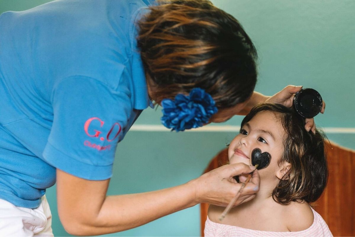 Face painting at Club Med Kani Kids' Club in the Maldives.