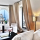 View of the Eiffel Tower through the circular window of the Eiffel Suite at Le Metropolitan Hotel in Paris..