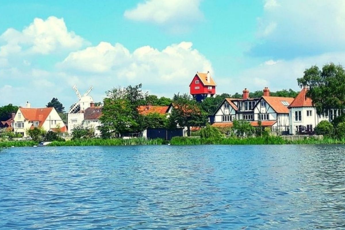 View of the House in the Clouds across the Meare in Thorpeness in Suffolk.
