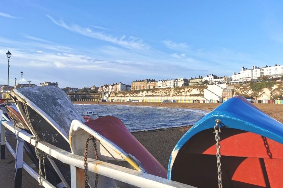 Boats in the foreground with Viking Bay beach in Broadstairs in the background.