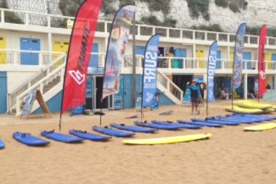 Surf boards lined up on Viking Bay beach in Broadstairs.