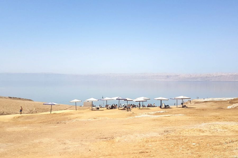Parasols on the beach at the Crowne Plaza Dead Sea Resort.