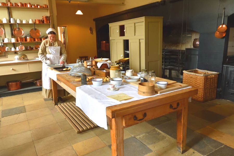 Victorian servant in the kitchen at Audley End.