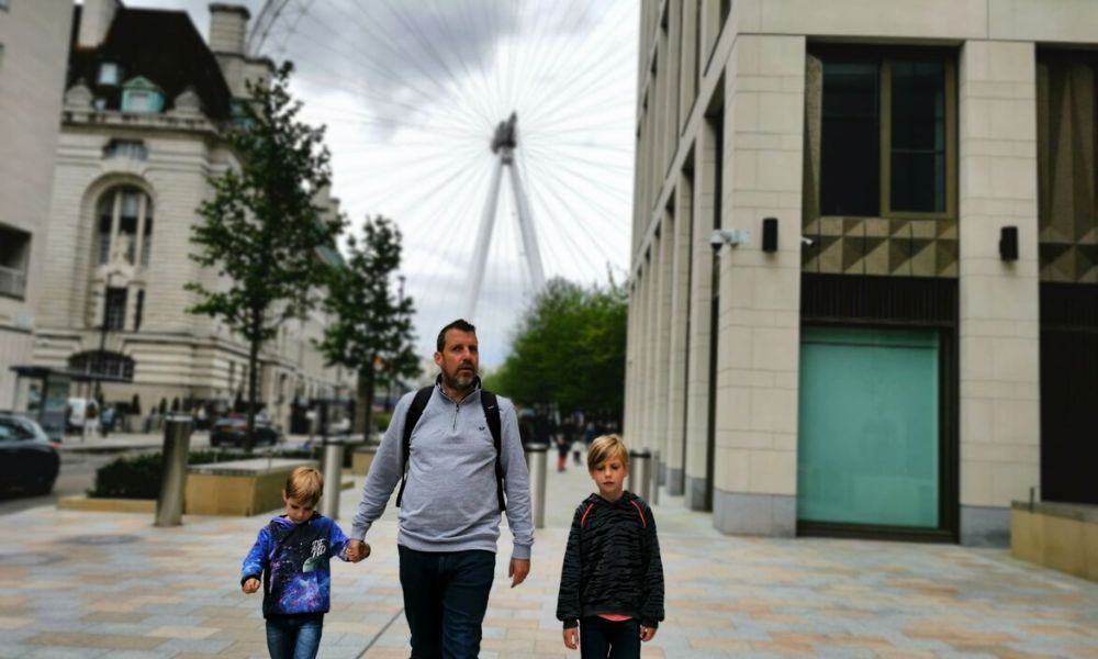 Family walking from Shrek's Adventure to Waterloo Station.