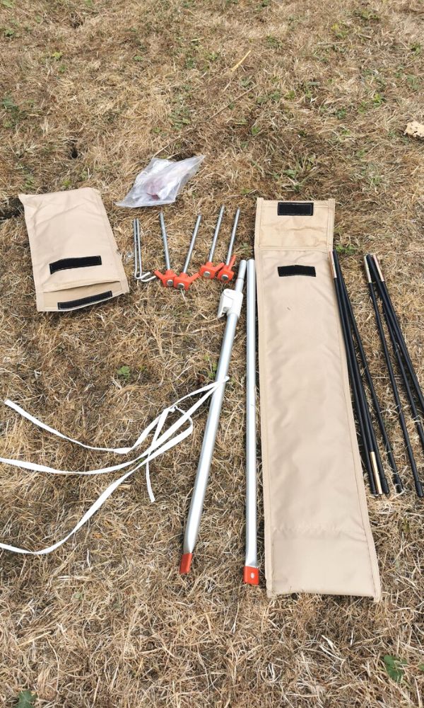Poles and tent pegs for the Quechua Air Seconds 4.2 family tent.