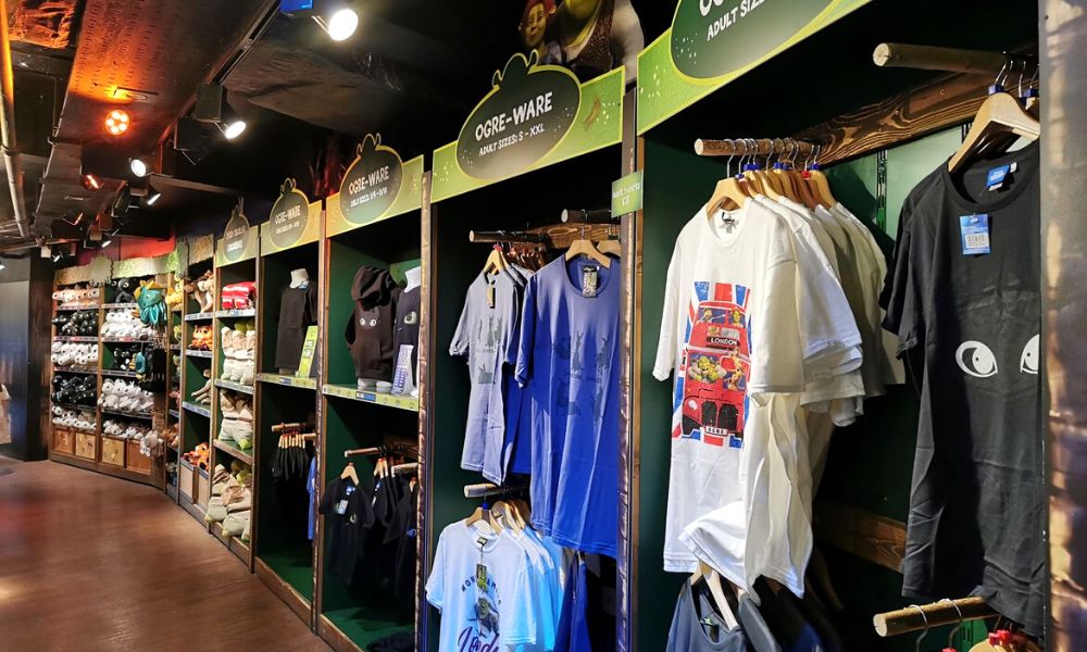 Tshirts and soft toys on display at the gift shop at Shrek's Adventure.