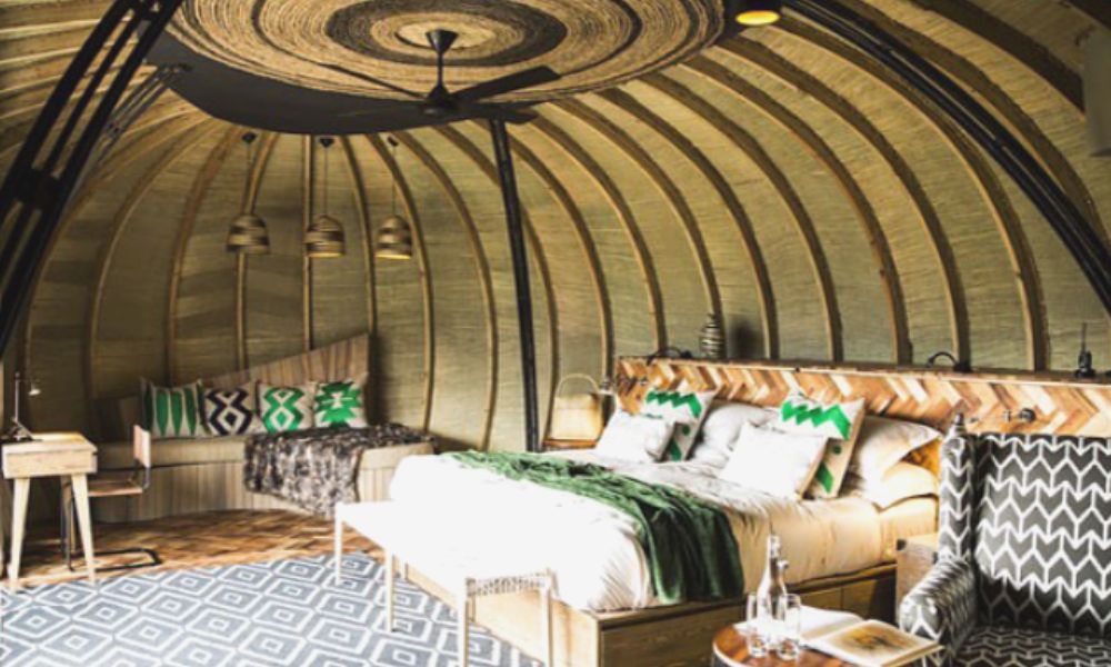 Bedroom of a Forest Villa at Bisate Lodge in Volcanoes National Park in Rwanda offers a truly incredible safari experience in Africa.