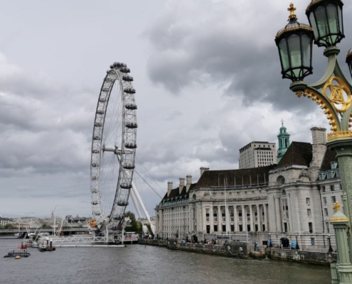 View of County Hall and the London Eye from Westminster Bridge in London.