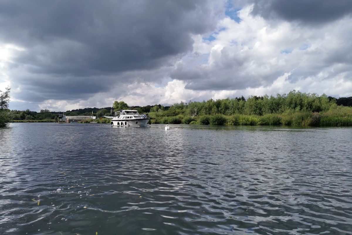 Boat on the Norfolk Broads in Norfolk.