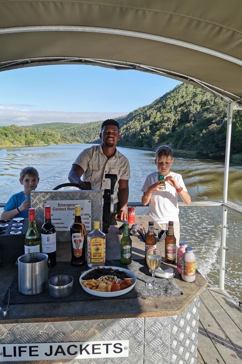 People on a river cruise at Kariega Game Reserve.